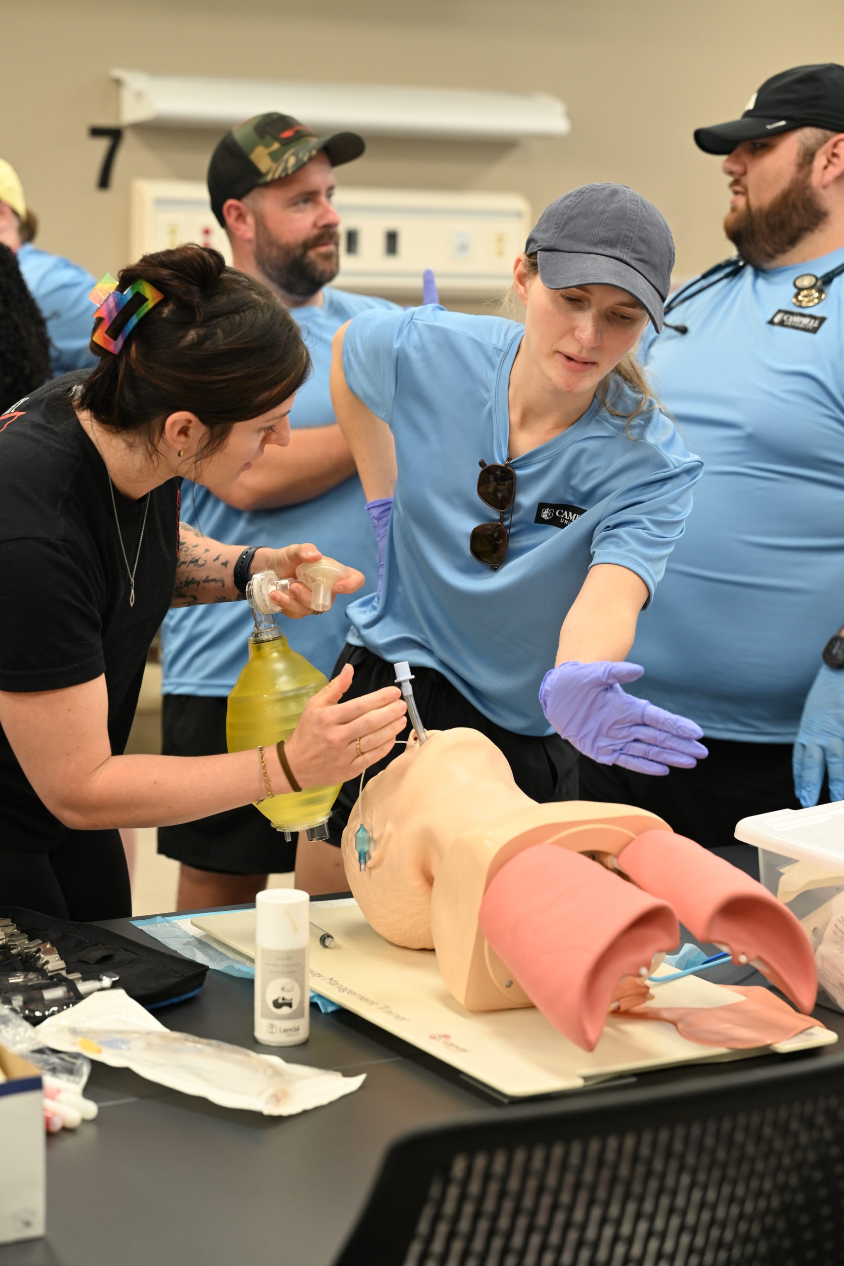 Female PA student learning about intubation from female instructor