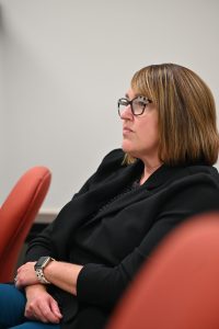 Faculty listening to presentation