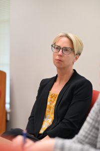 Faculty listening to presentation