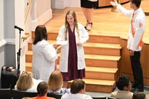 Student receives a note from an alumnus, family member or friend as they walk off stage