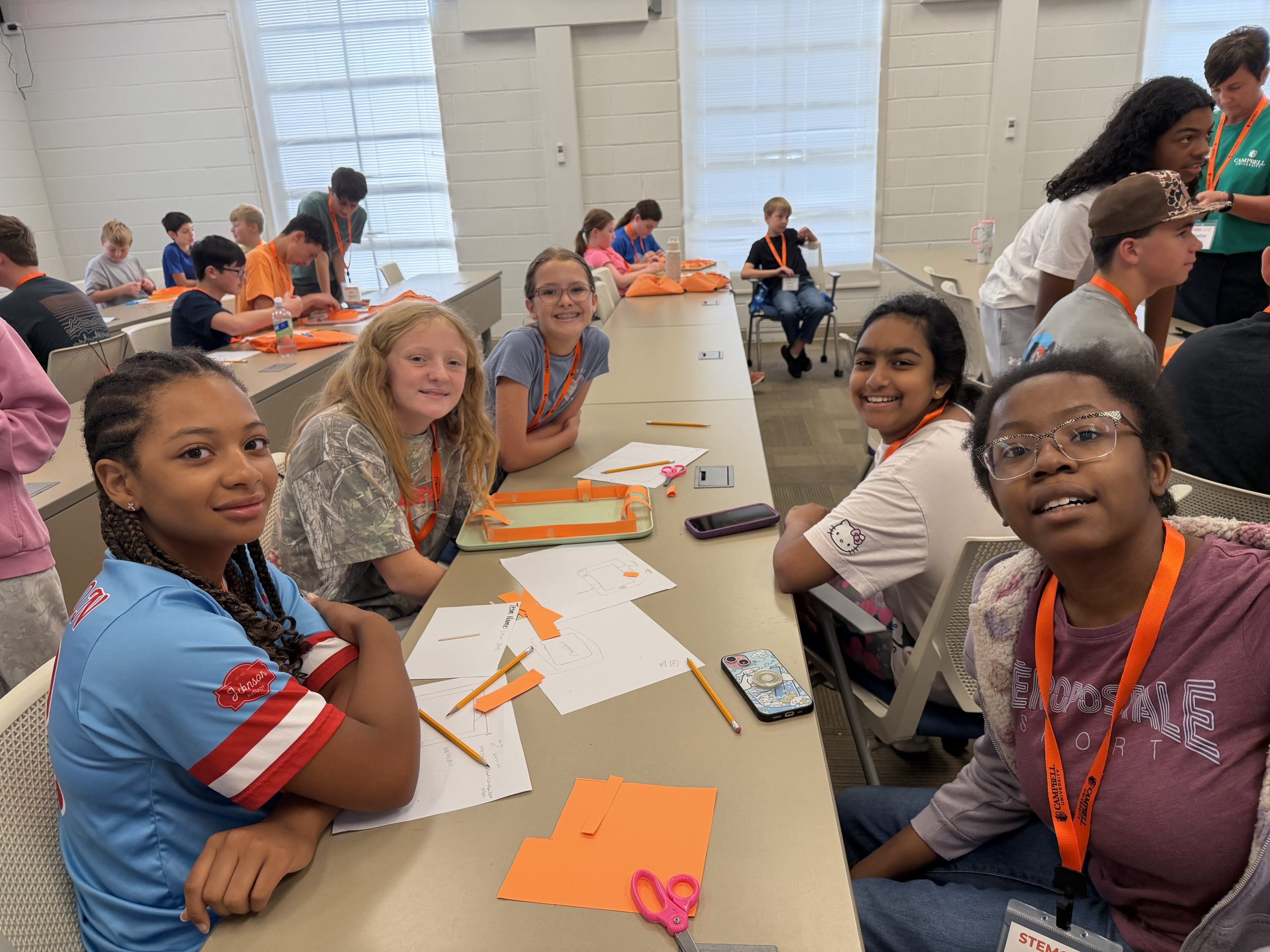 Middle school STEM Camp participants collaborate on a hands-on classroom activity at Campbell University.
