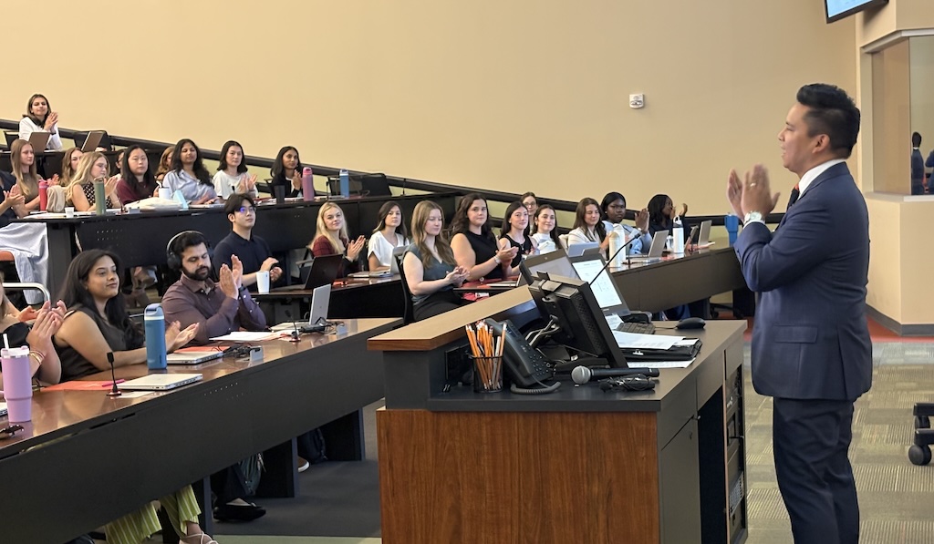 Dr. Tolentino speaks with students at Campbell's medical school