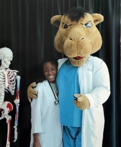 Student Dr. Khalia Solaita and Gaylord, when she was in high school.