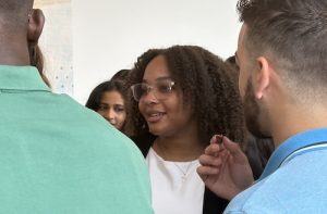 Photo of students talking during med school orientation.