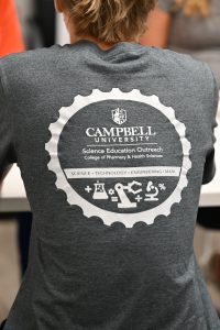 Science Education Outreach logo on back of shirt