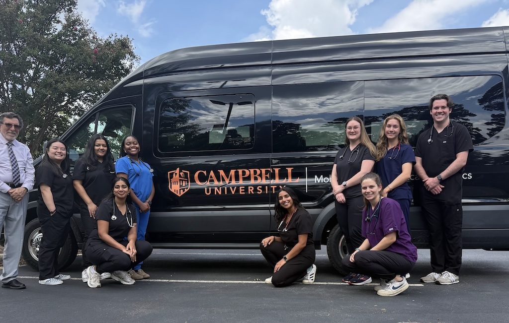 From left to right, Dr. Joseph Cacioppo, Joanne Lee, Nehal Chakraborty, Lacey-Ann Reynolds, Megha PB (kneeling), Sindhoor Ambati (kneeling), Emma Norris (kneeling), Mariah Lee, Claire Nguyen and Daniel Staas. Chase Poli (not pictured)