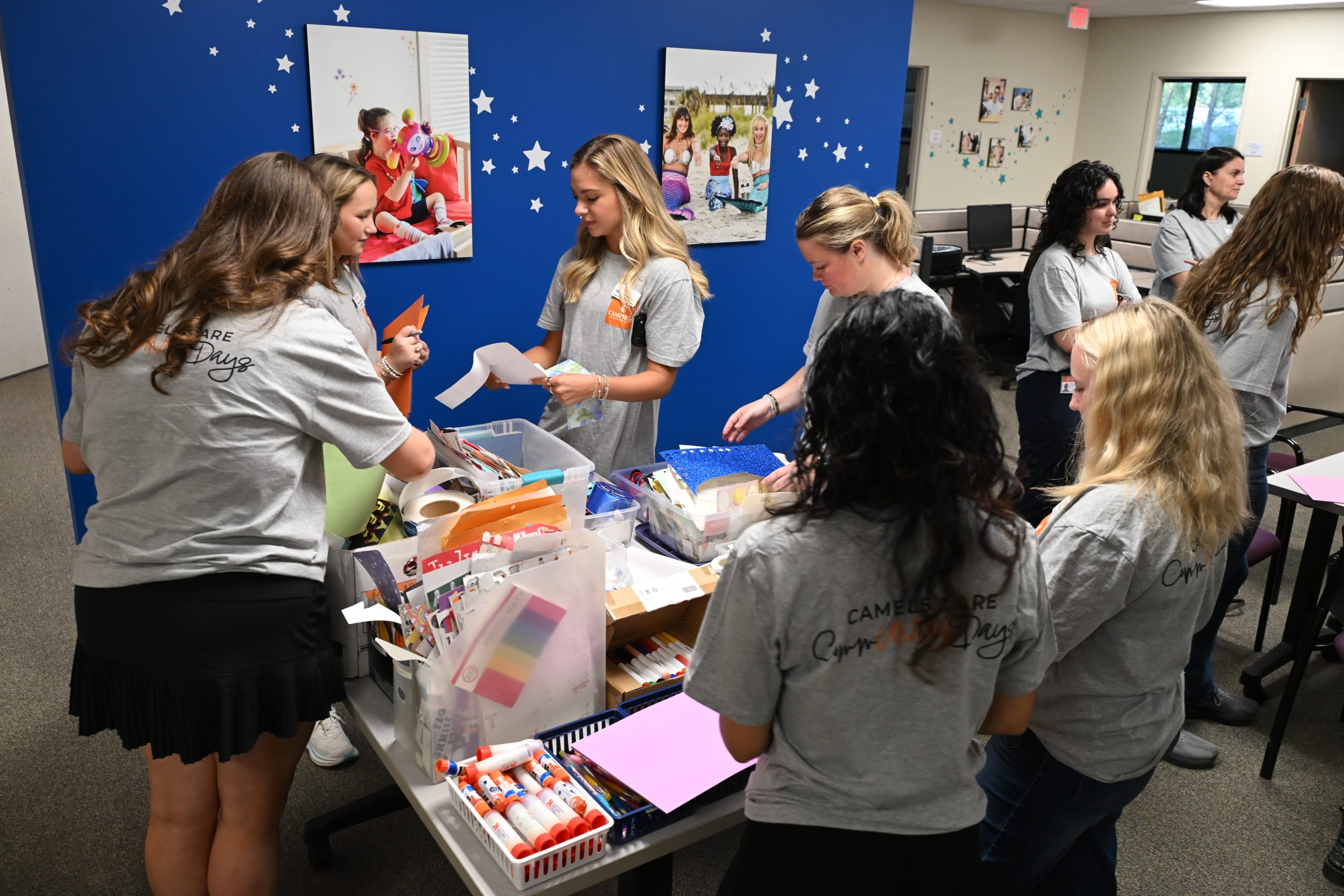 Students working at Make A Wish