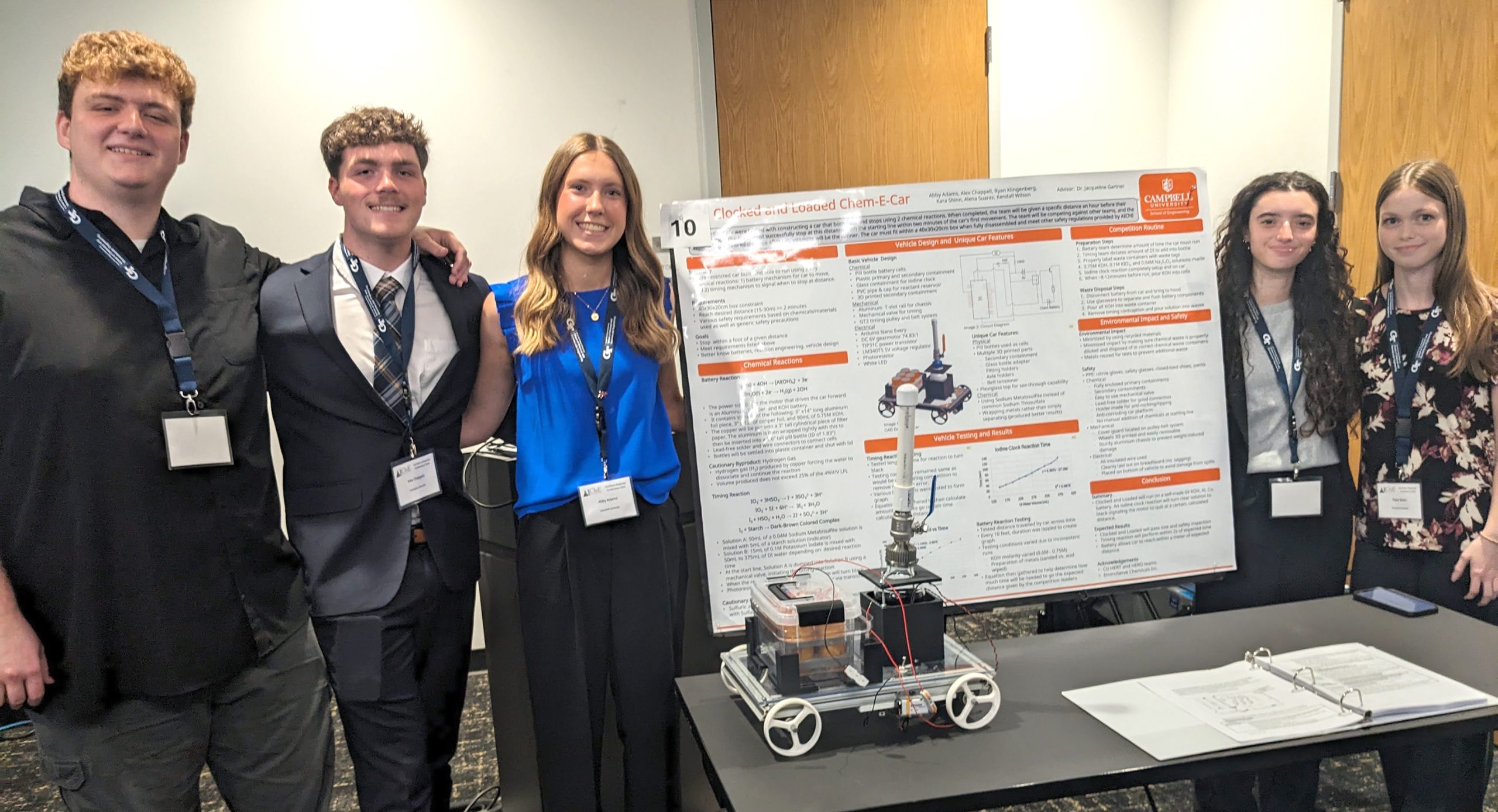 Group of students and their chemical-powered car