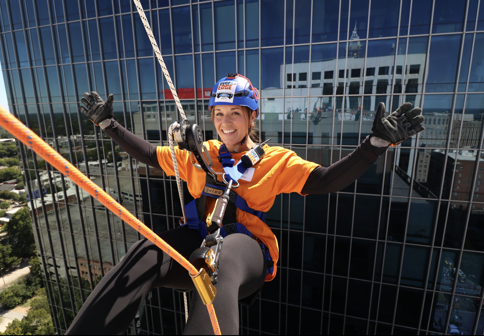 Photo of Ashlee Drew '27 hanging over the edge