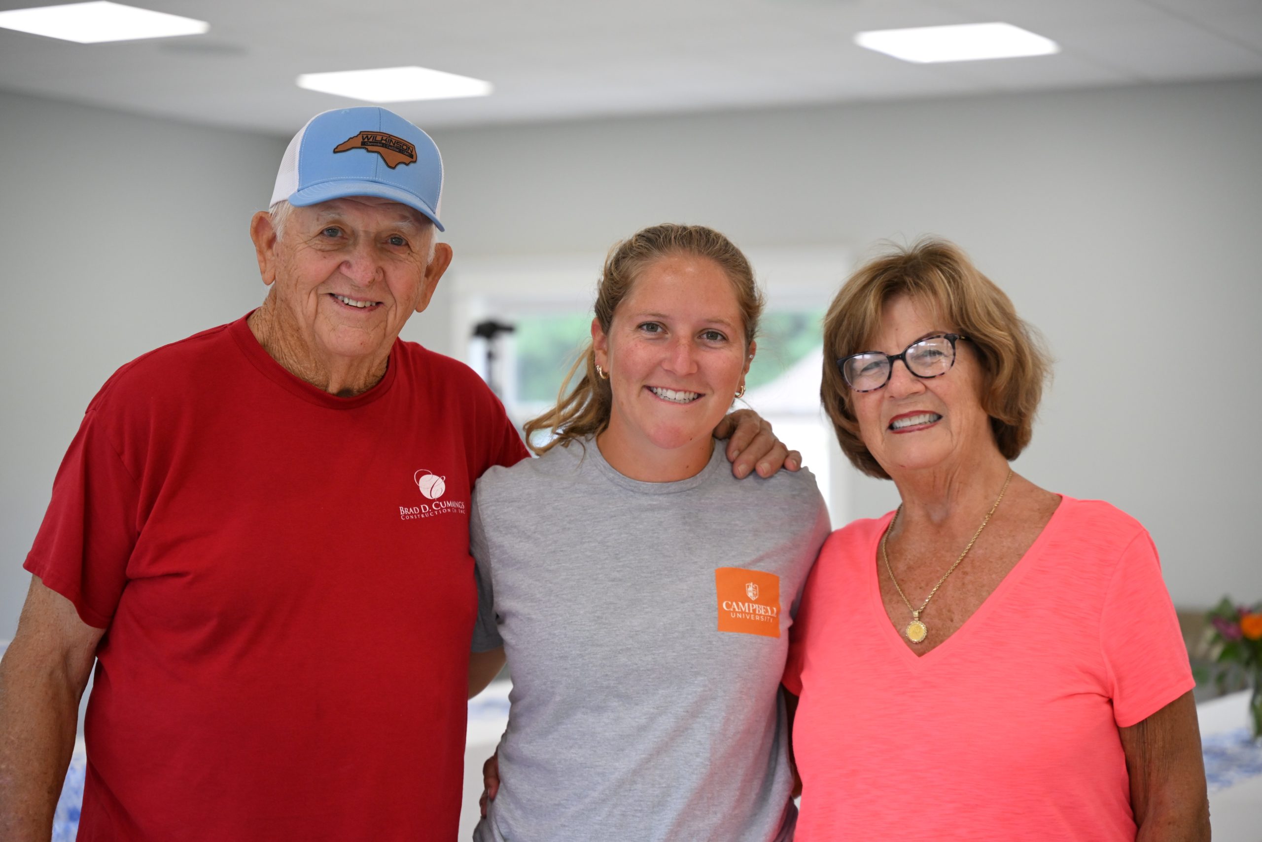 Two adult seniors with student