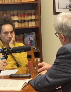 Photo of author and podcaster Malcolm Gladwell interviewing Professor Greg Wallace