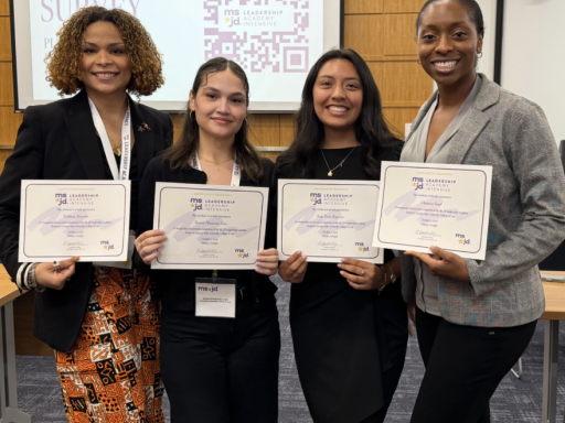 Photo of Brittany Swanger ‘27, Suzy Brito Lagunas ‘27 and Karina Plasencia-Leos ‘28 and Chimara Good '28 holding certificates from Ms. JD