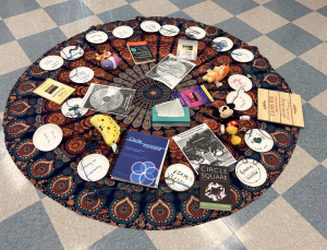 Photo of a table with books and pamphlets touting circle therapy