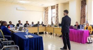 Photo of Professor Chris Cox teaching class in Rwanda