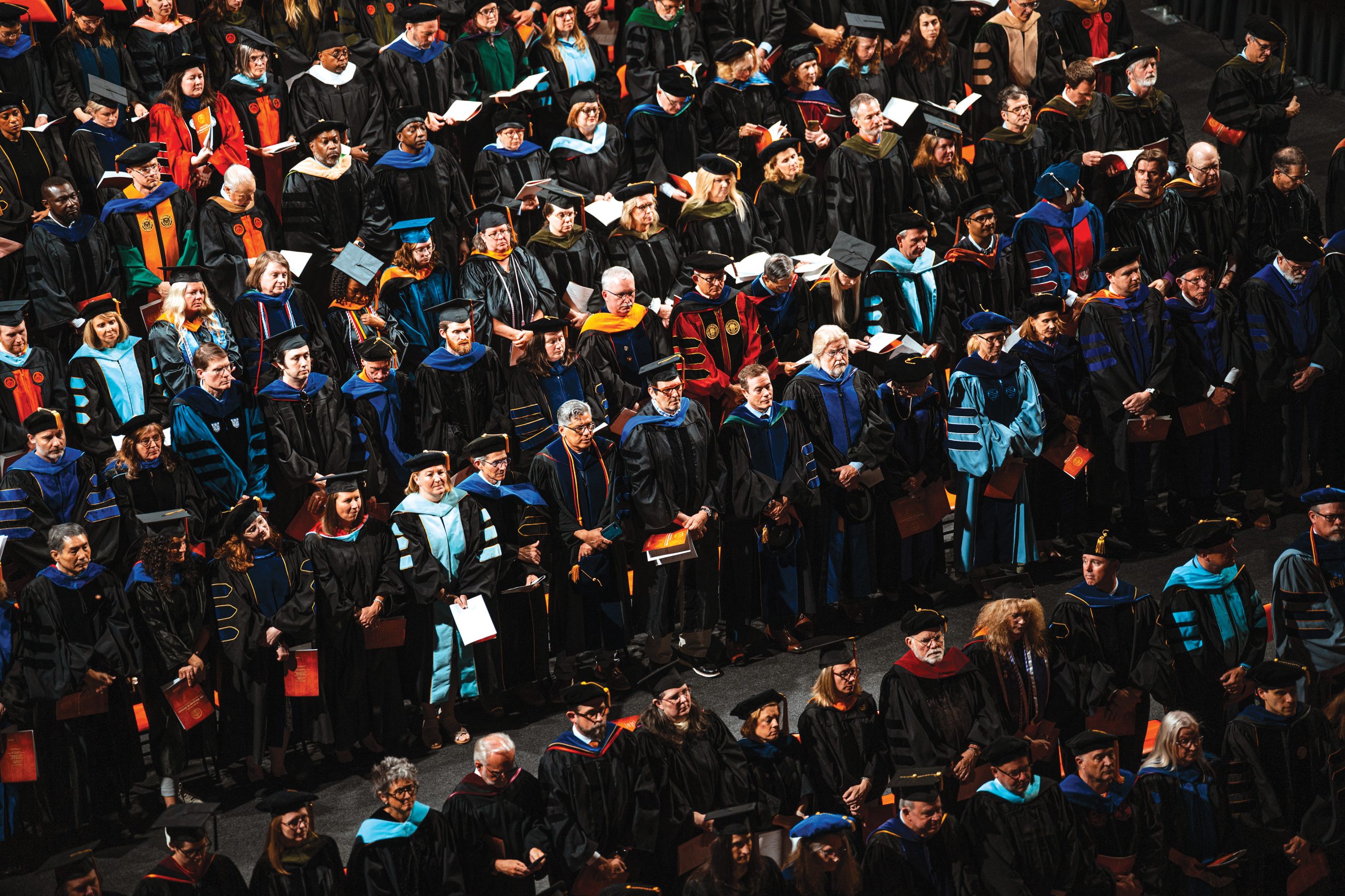 An overhead photo of professors in their robes at the inauguration ceremony.