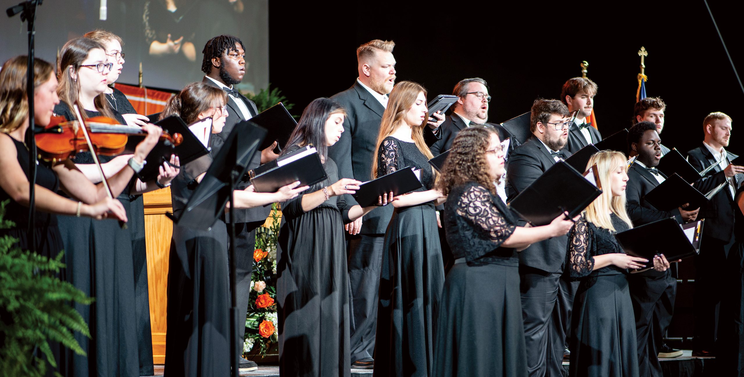 Campbell University choir performing during the ceremony.