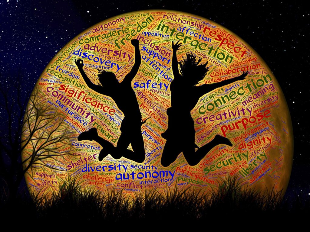 image of teens jumping in the moonlight