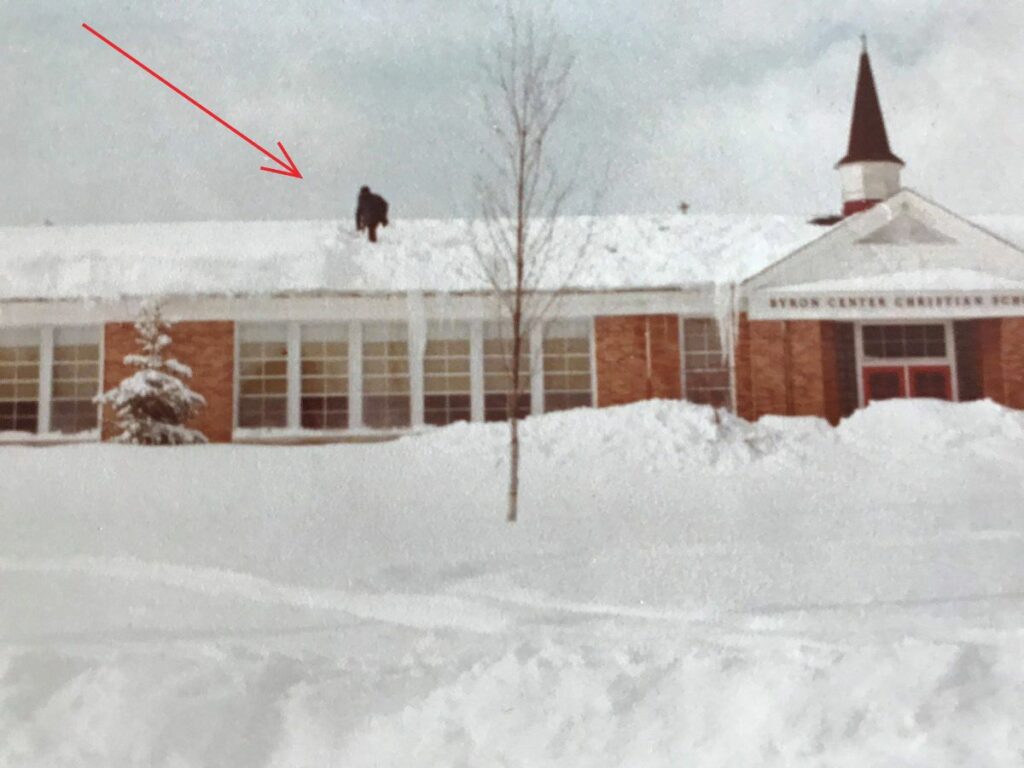 Gerald Bronsink shoveling snow