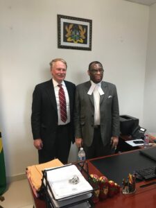 Photo of Dean Leonard posing with Ghanian Justice Charles Baden