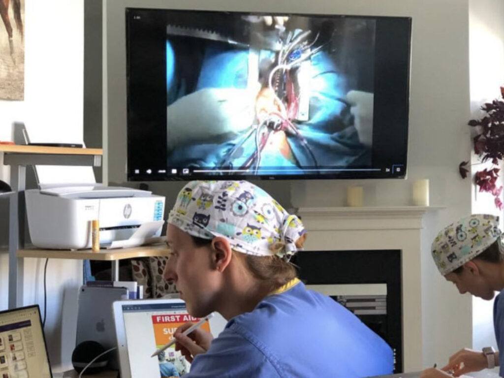 medical students looking at virtual surgery