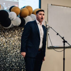 Photo of student singing in talent show