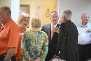 Dr. and Mrs. Downs greeting members of the Golden Club