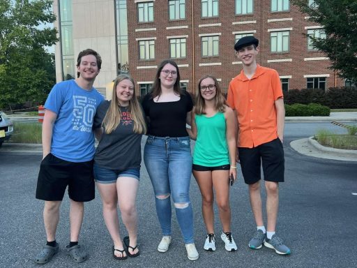Emma Guild (center) with fellow students