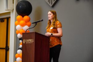 Emily Denning speaking at the 2025 Legacy Luncheon