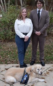 Photo of Brooks Savage '19 and Brad Piland '17 and Brooks' dog Bailey