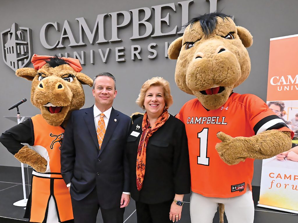 Dr. Downs and Kim Downs with mascots Gaylord and Gladys