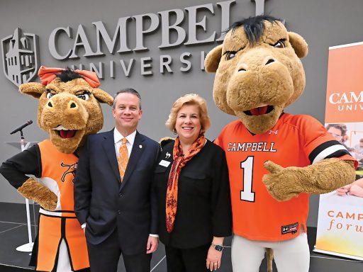 Dr. Downs and Kim Downs with mascots Gaylord and Gladys