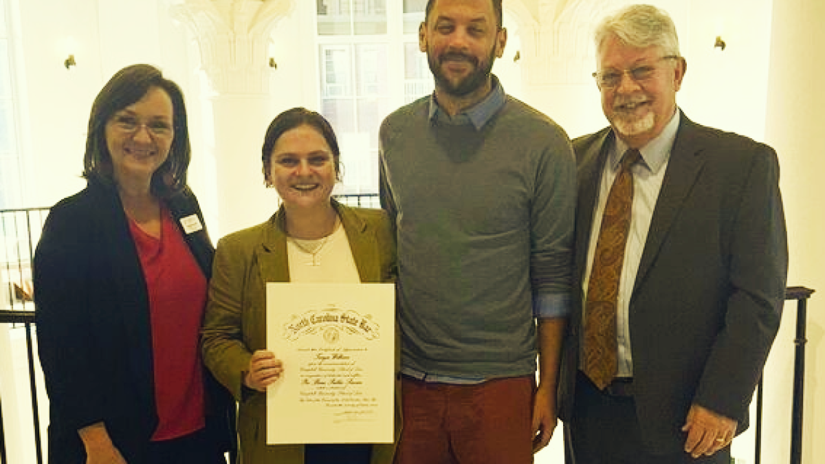 Photo of Joia Powell, Taryn Wilkins, Taryn Wilkins husband and Professor Jon Powell