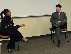 Photo of Wallace Fellow Darrah Perry '25 holding a mock interview with Campbell Law student Reese Dickerhoff '26