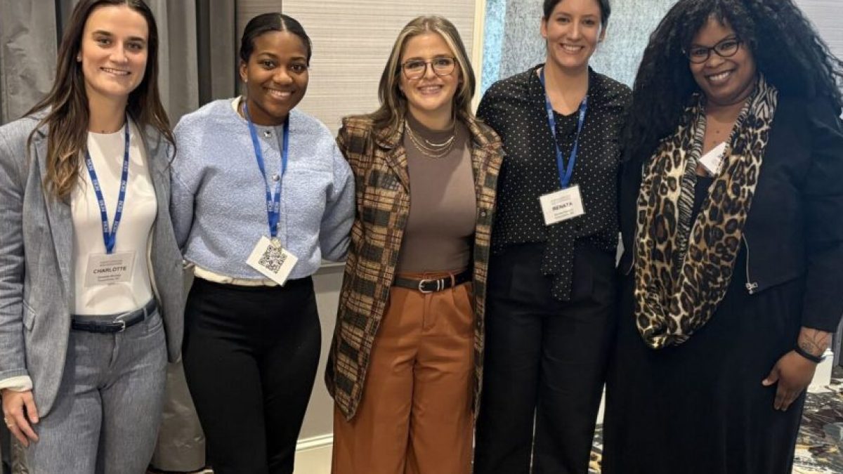 Photo of five women posing with Charlotte Munsey '28 on the left