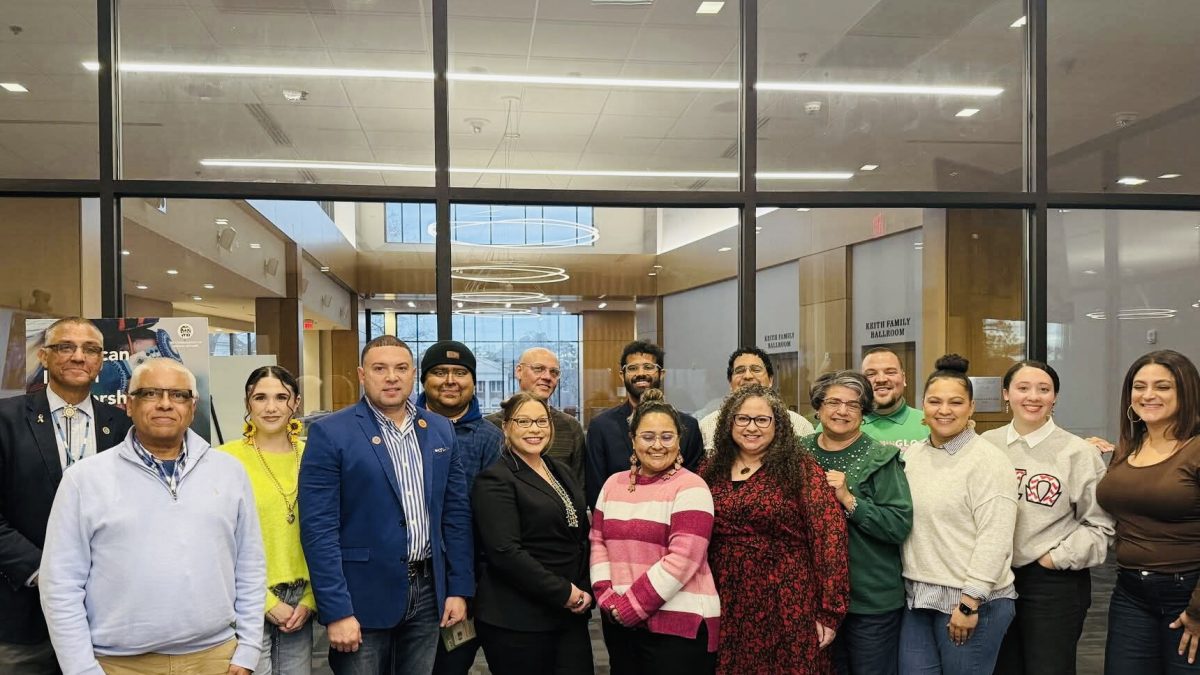Group together posing for photo at Oscar N Harris Student Union.
