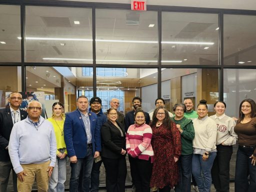Group together posing for photo at Oscar N Harris Student Union.