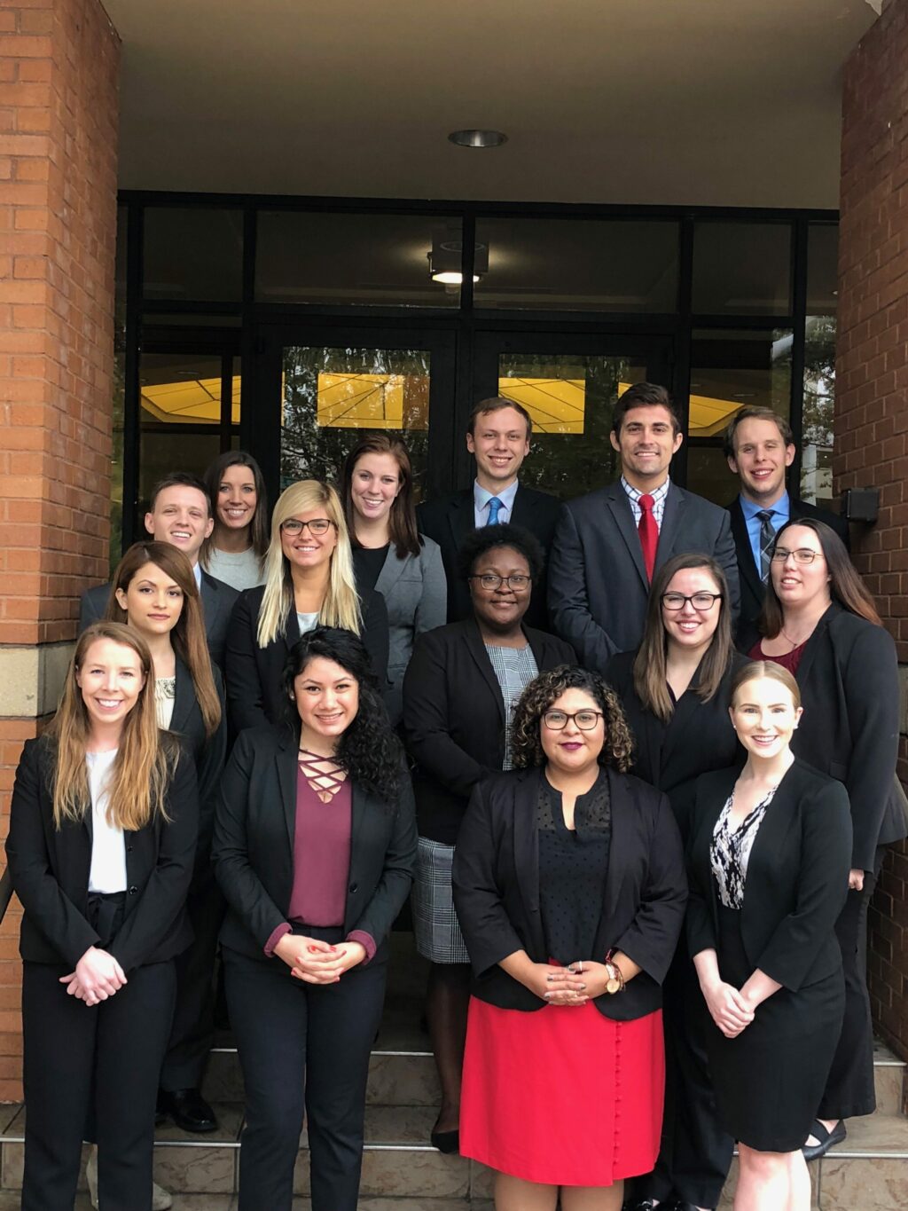 Photo of the Pro Bono Council members on the law school steps